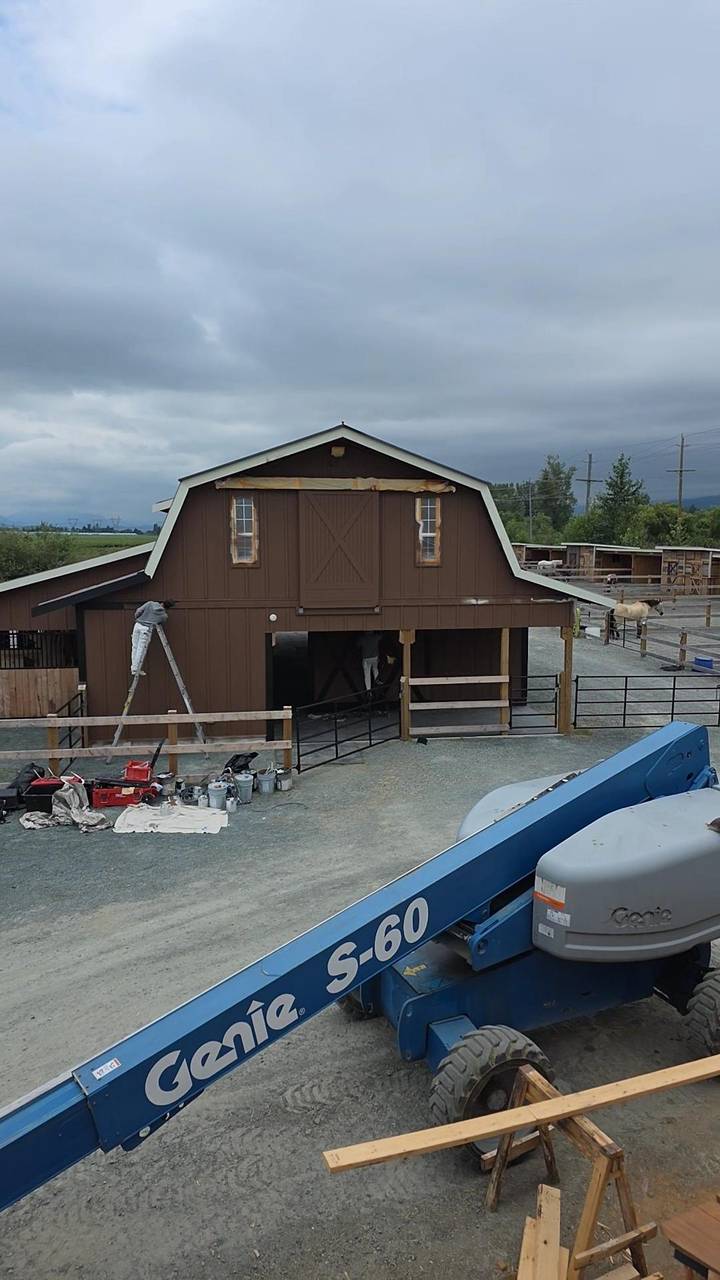 Gambrel barn while the brown paint is going on