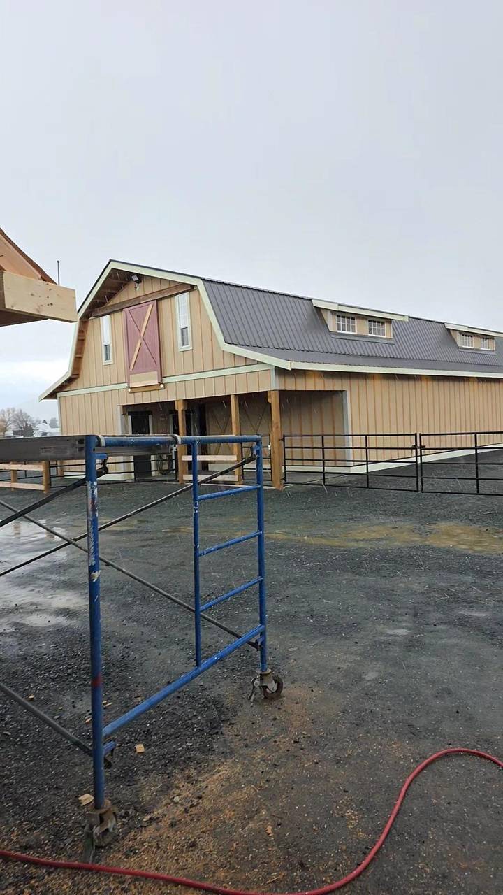 Gambrel in primer, metal roof on, before the brown paint