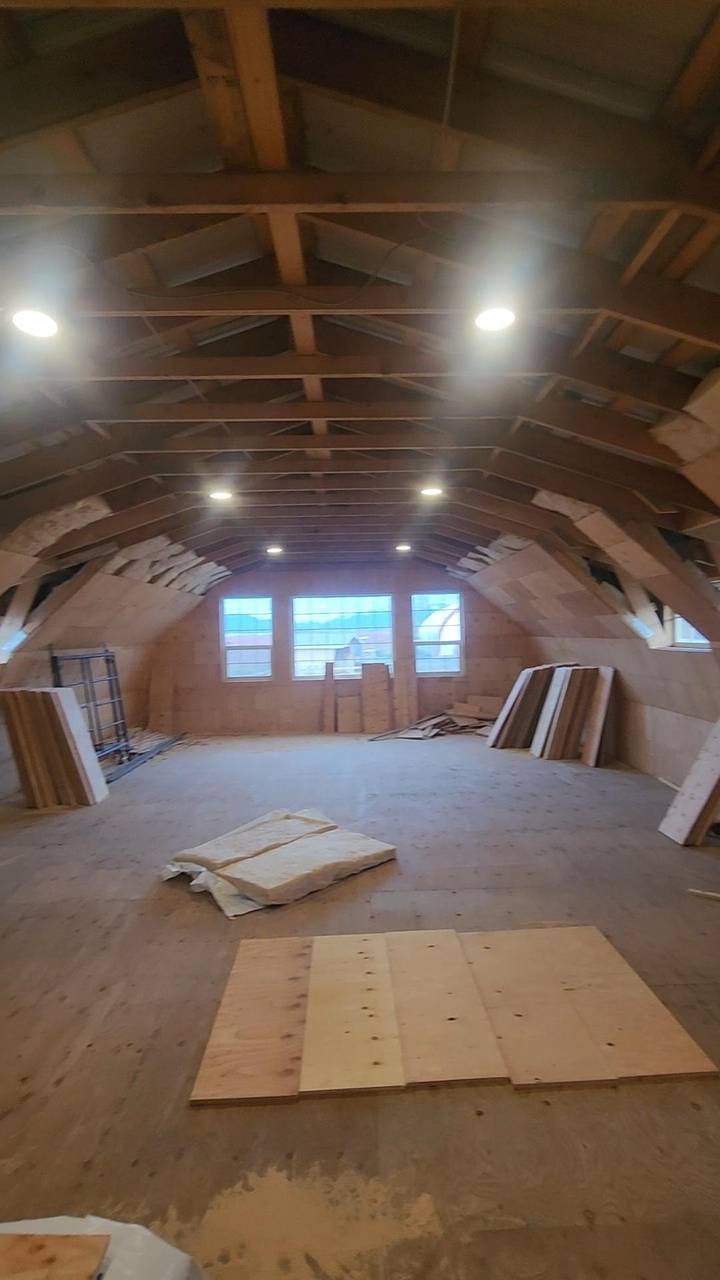 Barn loft while the gambrel trusses are still open